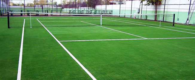 Pistas de tenis con césped artificial